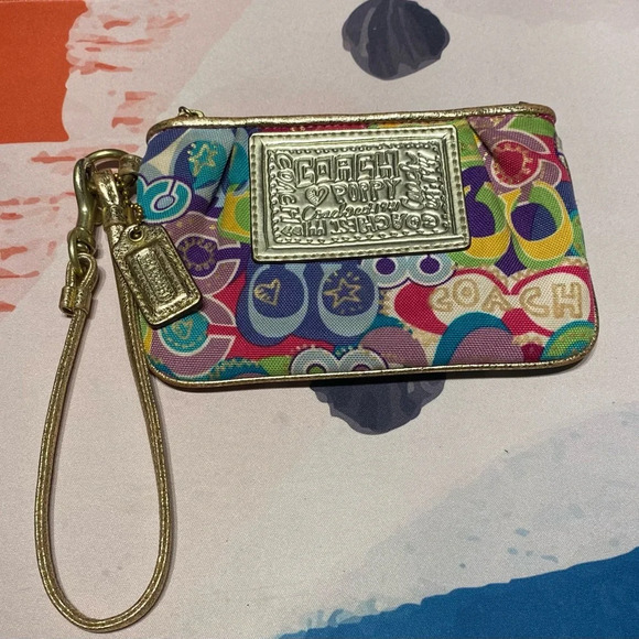 Coach Handbags - Coach Poppy Wristlet Metallic Gold and Multi-Colored Canvas Pre-Loved